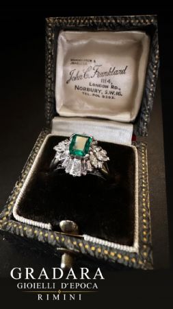 Platinum ring with emerald and diamonds