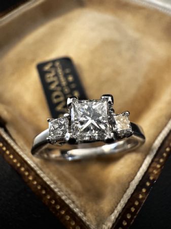 Trilogy type ring with Princess cut Diamonds