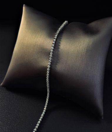 Brazalete de tenis con 2 garras