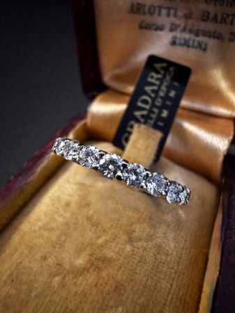 Full eternity band with 1.5 ct diamonds.