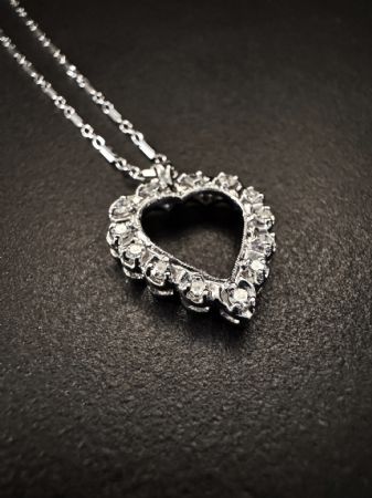 Heart pendant with diamonds.