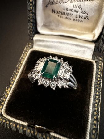 Platinum Ring with Emerald and Diamonds