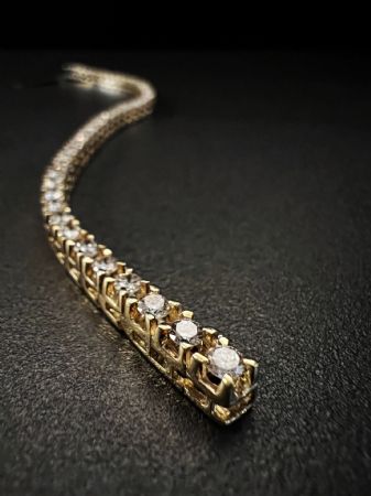 Yellow gold tennis bracelet