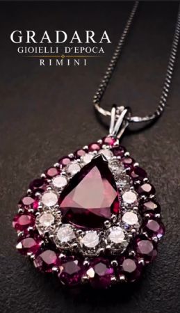 Pendant with a 2.5 ct. pear-shaped ruby and 1.5 ct. diamonds.