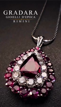 Pendant with a 2.5 ct. pear-cut Ruby and 1.5 ct. Diamonds.