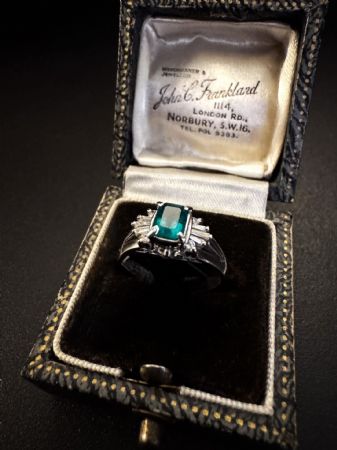 Platinum Ring with Emerald and Diamonds